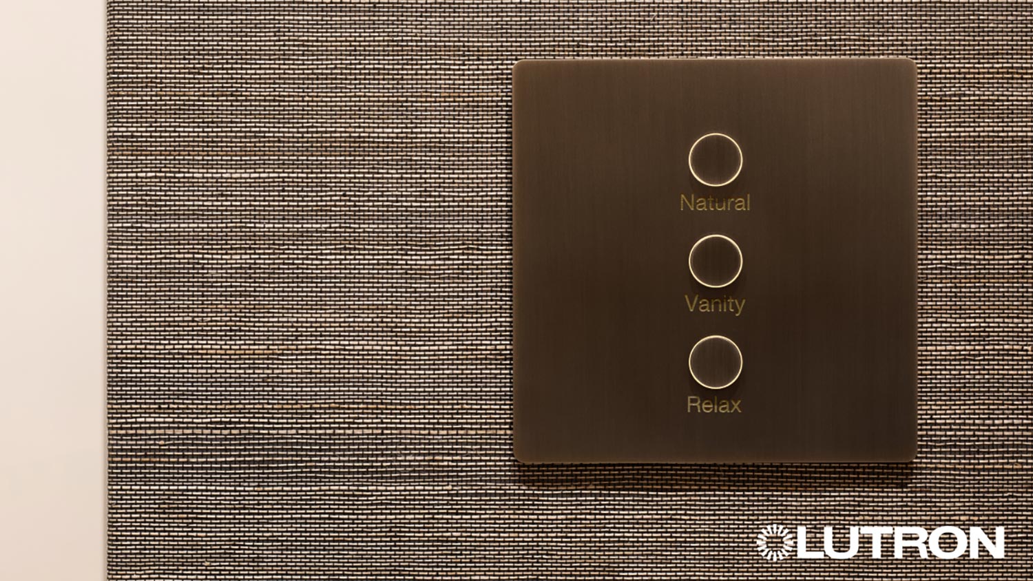 Wall-mounted lighting keypad in a fabric-covered wall